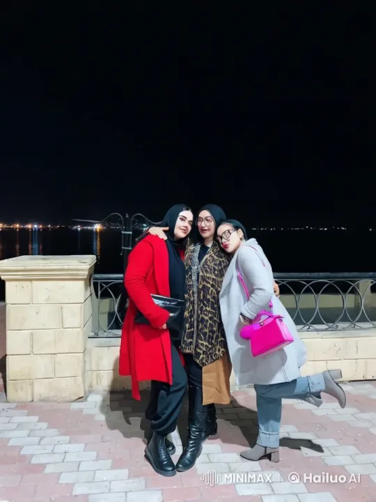 Nighttime Friendship Pose by Waterfront – AI Generated Video | Hailuo AI