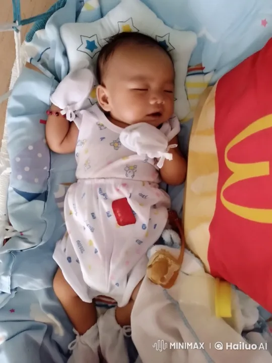 Baby Joyfully Dances and Playfully Punches in Cradle – AI Generated Video | Hailuo AI