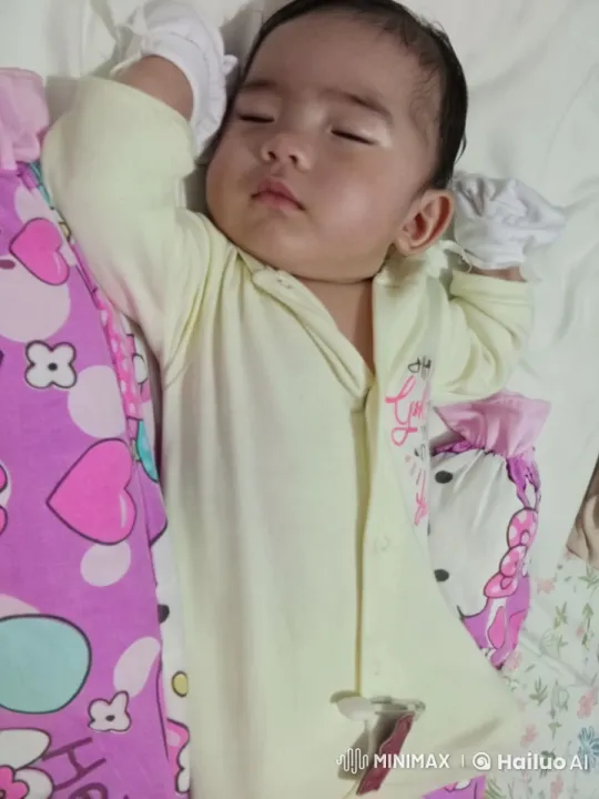 Cute Baby Dancing Playfully on Colorful Bed – AI Generated Video | Hailuo AI