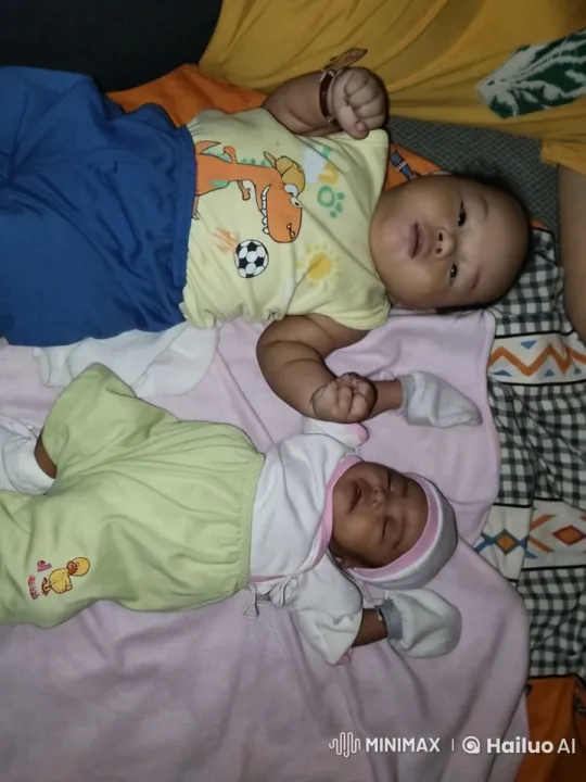 Babies Dancing Playfully on a Blanket – AI Generated Video | Hailuo AI