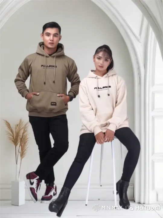 Two Hoodie-Wearing Individuals Engage in Lively Conversation – AI Generated Video | Hailuo AI