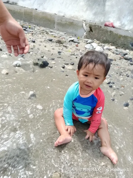 Joyful Child Dancing on a Rocky Beach – AI Generated Video | Hailuo AI