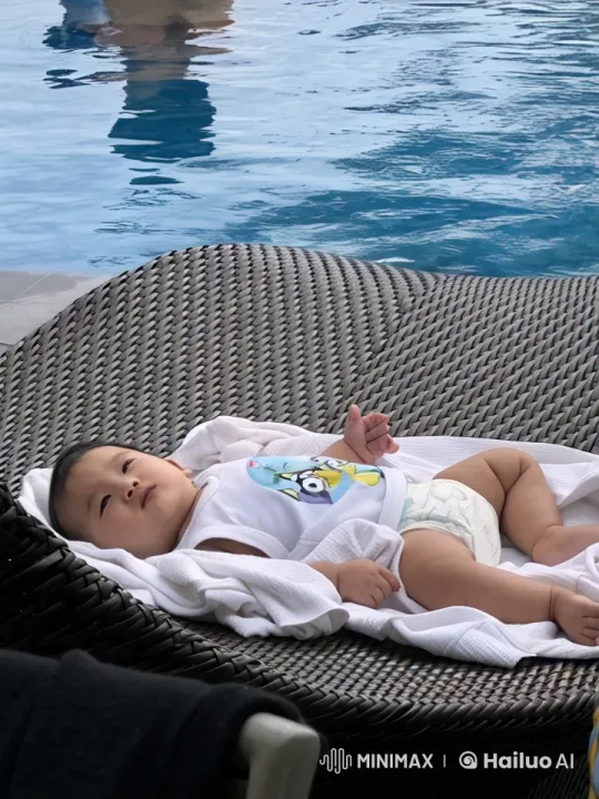 Baby Dancing by Pool in Cartoon Onesie – AI Generated Video | Hailuo AI