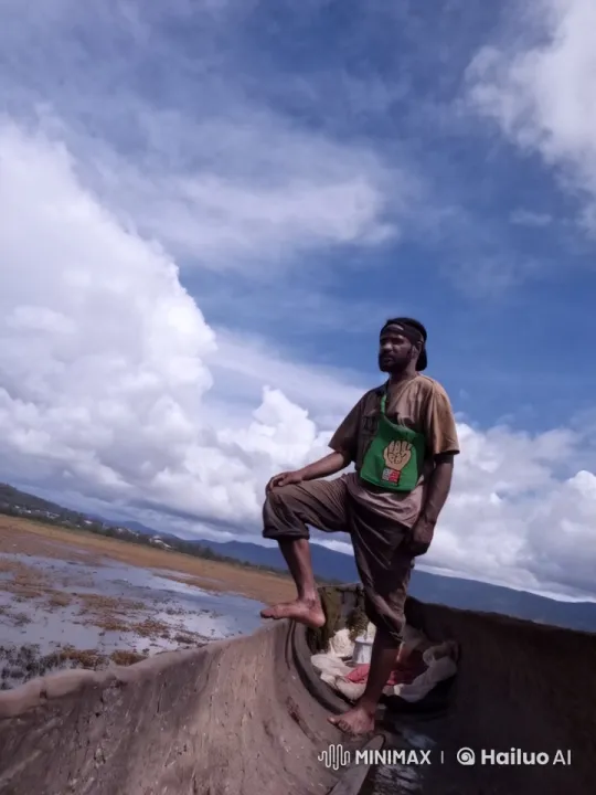 Man Stands Confidently on Rocking Boat Amidst Marshland Landscape – AI Generated Video | Hailuo AI