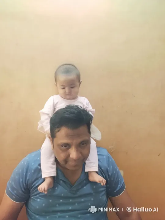 Father and Baby Delight in Joyful Dance – AI Generated Video | Hailuo AI