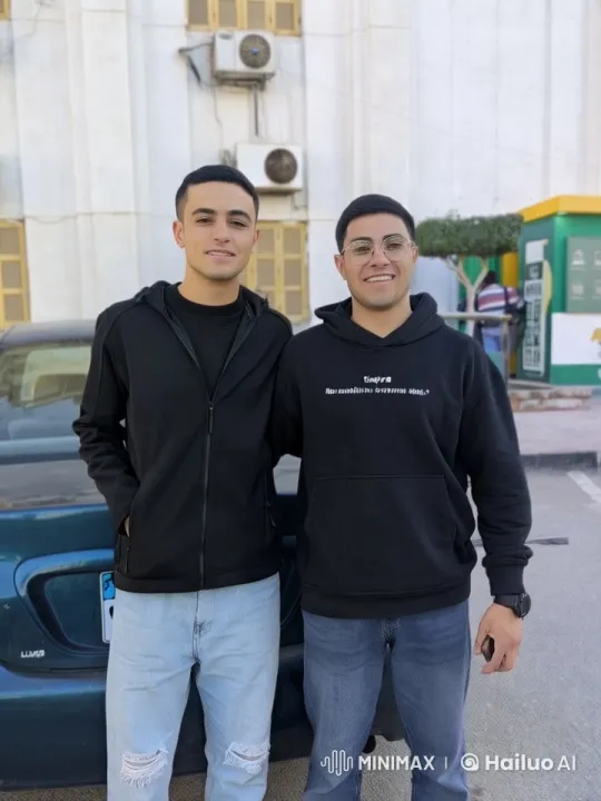 Two Men Pose for Animated Photo in Front of Car – AI Generated Video | Hailuo AI