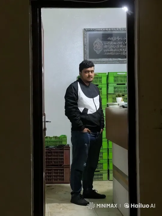Man in Casual Attire Stands Bored in Dimly Lit Room – AI Generated Video | Hailuo AI
