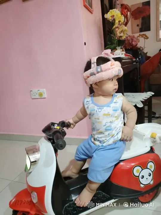 Baby Enacts Playful Kung Fu Moves on Toy Motorbike – AI Generated Video | Hailuo AI