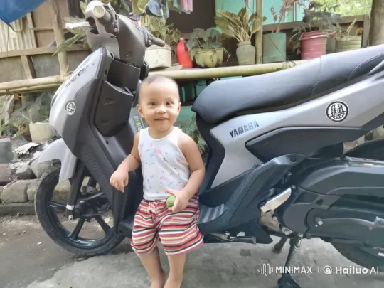 Child Joyfully Dancing by Yamaha Motorcycle in Live2D – AI Generated Video | Hailuo AI