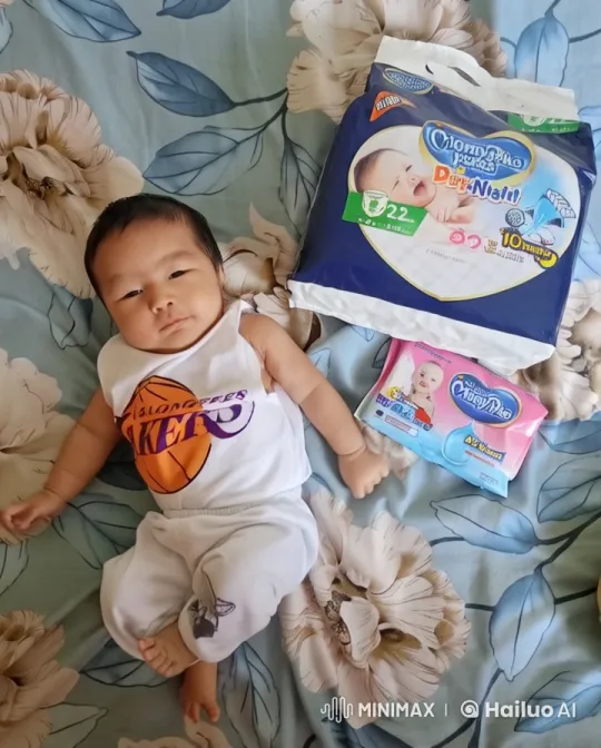 Baby Dancing in Lakers Outfit on Floral Bed – AI Generated Video | Hailuo AI