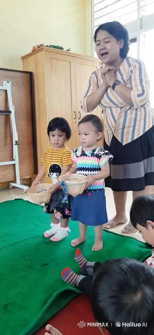 Children Engage in Activity on Green Mat – AI Generated Video | Hailuo AI