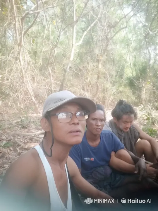 Individuals Resting in a Forest Setting – AI Generated Video | Hailuo AI