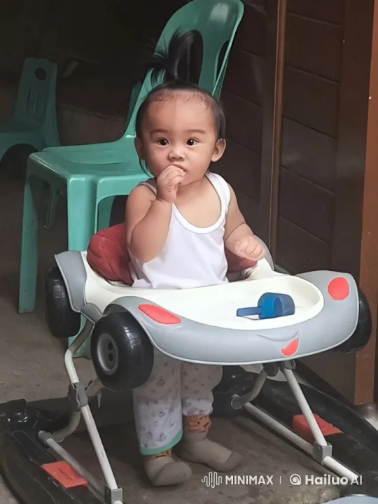 Baby Enthusiastically Dances and Practices Kung Fu in Walker – AI Generated Video | Hailuo AI