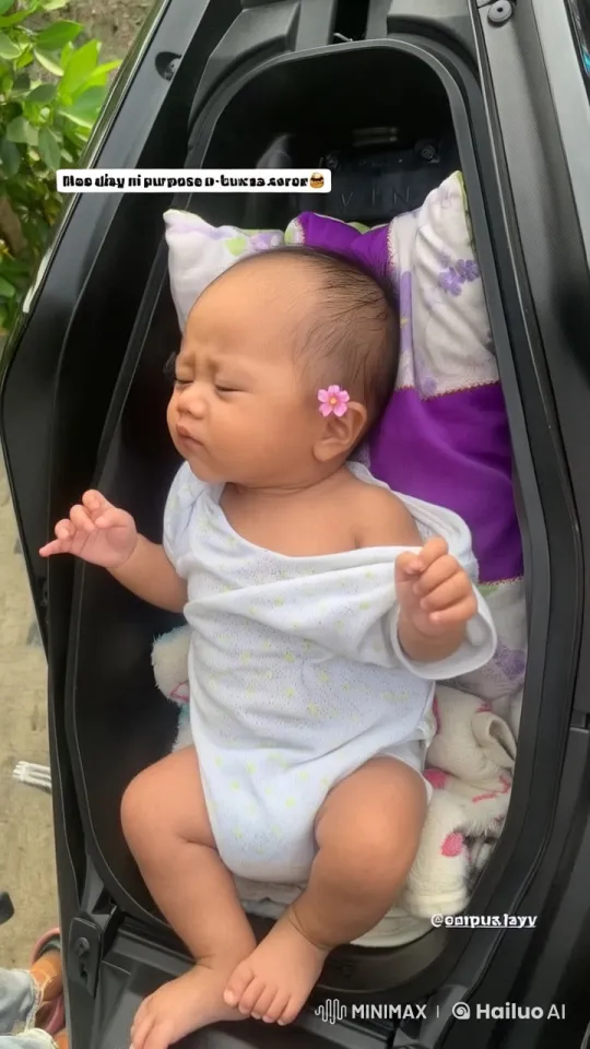 Baby Dancing and Playing in Motorcycle Compartment – AI Generated Video | Hailuo AI