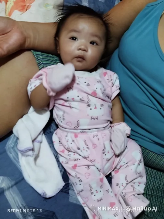 Baby in Pink Onesie Joyfully Dancing in 2025 – AI Generated Video | Hailuo AI