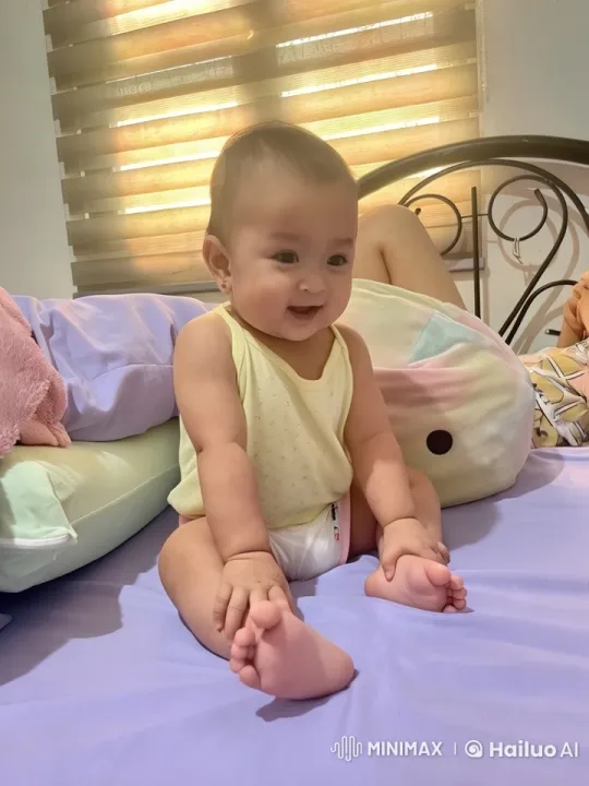 Baby Dancing Playfully on Purple Bed in Live2D Animation – AI Generated Video | Hailuo AI