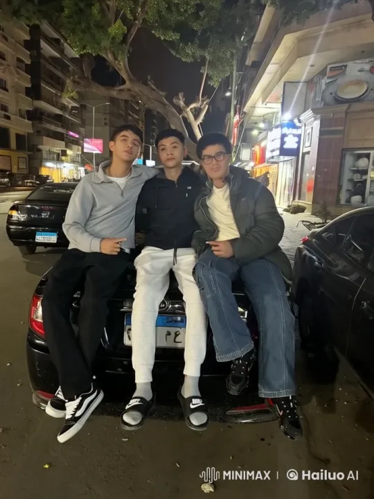 Three Friends Enjoy Night Out on Lively Street – AI Generated Video | Hailuo AI