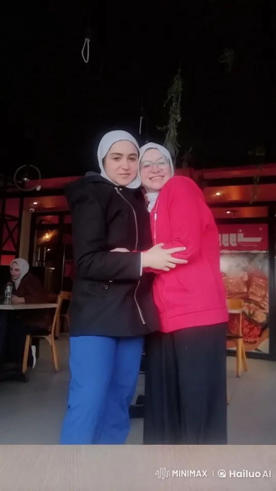 Cozy Restaurant Scene with Embracing Friends – AI Generated Video | Hailuo AI