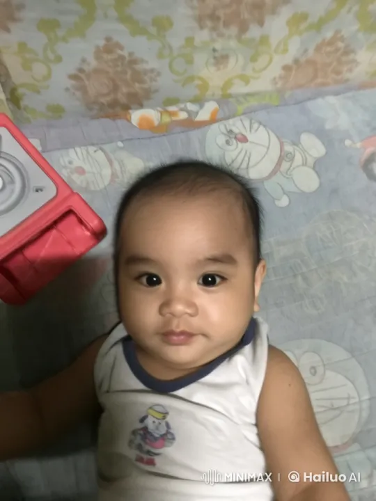 Baby's Joyful Dance in Cozy Bedroom Setting – AI Generated Video | Hailuo AI