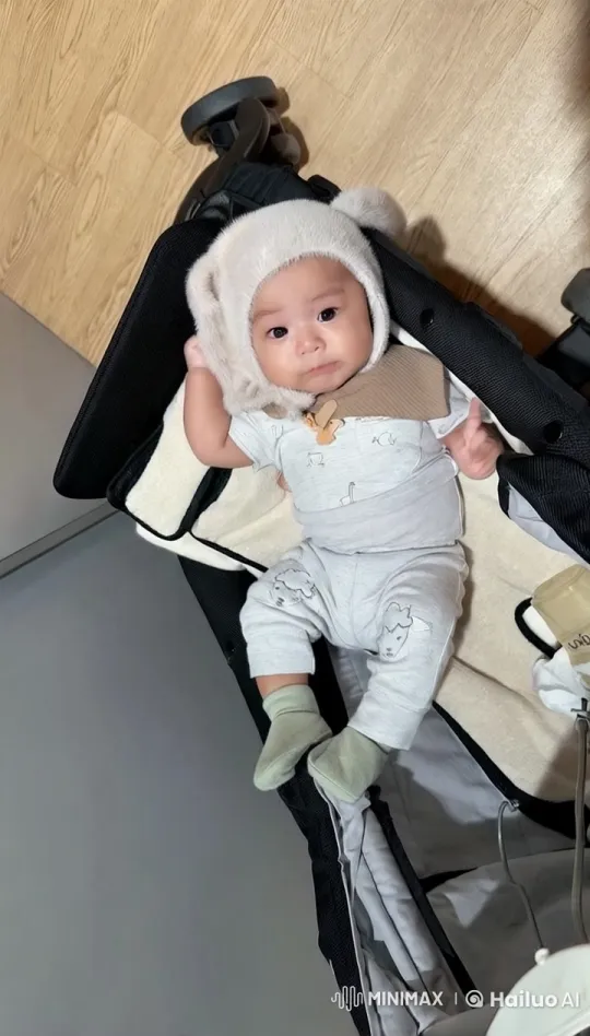 Baby Dances and Punches in Stroller Video – AI Generated Video | Hailuo AI