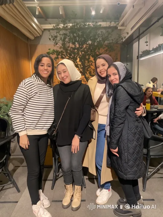 Four Women Display Martial Arts Skills in Cozy Café Setting – AI Generated Video | Hailuo AI