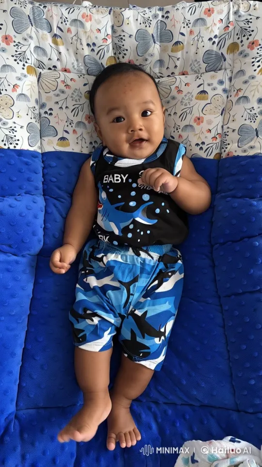 Baby Dancing Joyfully on Floral Blanket – AI Generated Video | Hailuo AI