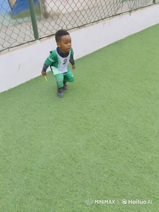 Young Child Performing Kung Fu on Playground – AI Generated Video | Hailuo AI