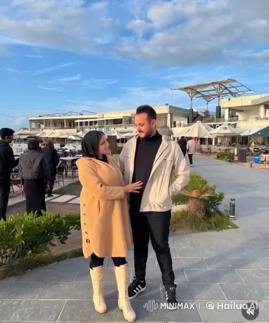 Couple's Playful Kungfu Routine at Seaside Café – AI Generated Video | Hailuo AI