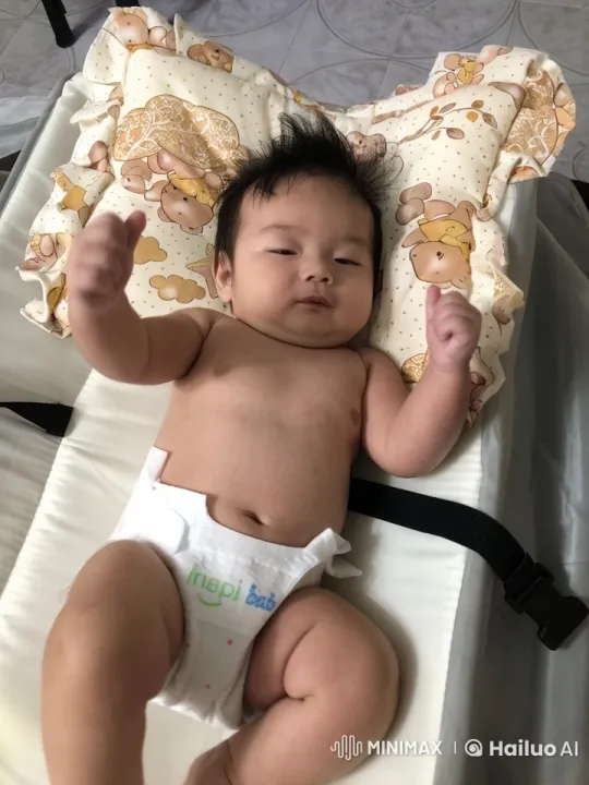 Cute Baby Dancing Joyfully on Changing Pad – AI Generated Video | Hailuo AI