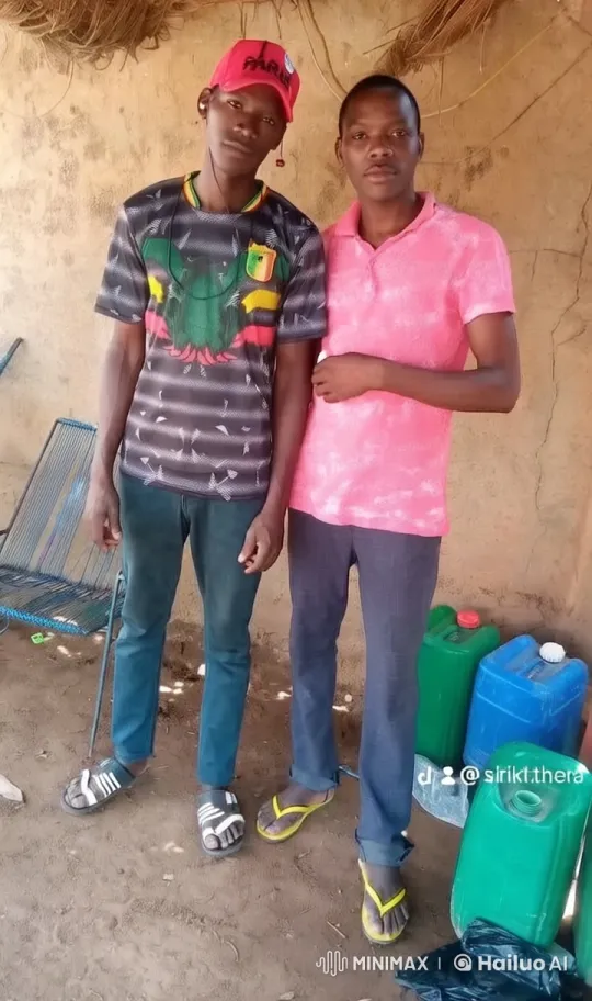 Two Men in Casual Pose with Vibrant Attire and Static Background – AI Generated Video | Hailuo AI