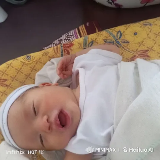 Baby Dancing Joyfully on Patterned Sheet – AI Generated Video | Hailuo AI