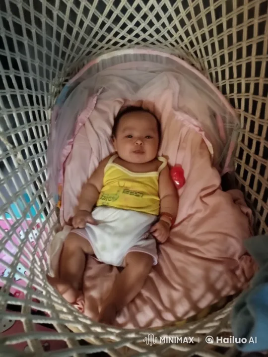 Baby Dancing Joyfully in Cozy Woven Bassinet – AI Generated Video | Hailuo AI