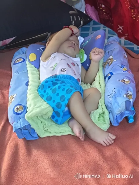 Baby Dancing Joyfully on Colorful Bed – AI Generated Video | Hailuo AI