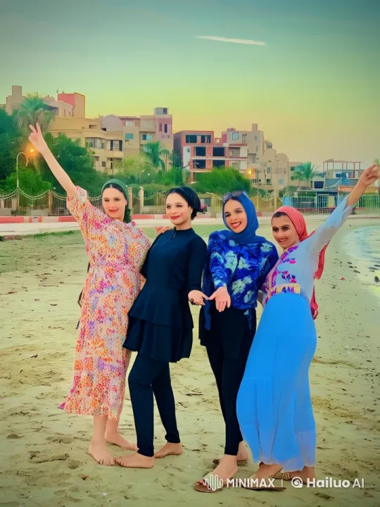 Joyful Women Dancing and Practicing Kung Fu on a Colorful Beach at Sunset – AI Generated Video | Hailuo AI