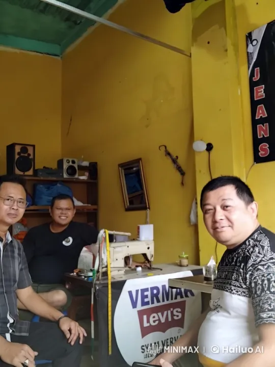 Vibrant Tailor Shop: Warm Atmosphere and Artisanal Craft – AI Generated Video | Hailuo AI