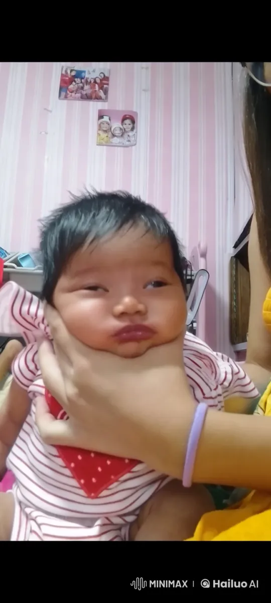 Baby Sings Lullaby in Cozy Room with Adult Support – AI Generated Video | Hailuo AI
