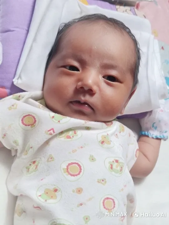 Baby Napping Peacefully in Cozy, Pastel-Colored Bedding – AI Generated Video | Hailuo AI