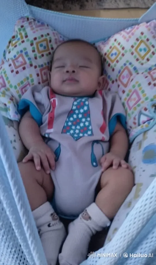 Baby Dancing Joyfully in Colorful Hammock Cot – AI Generated Video | Hailuo AI