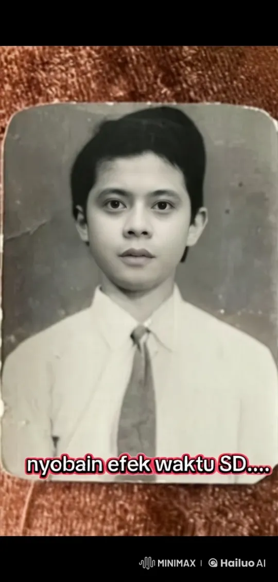 Vintage Boy Nostalgically Winks and Smiles in Live2D Animation – AI Generated Video | Hailuo AI