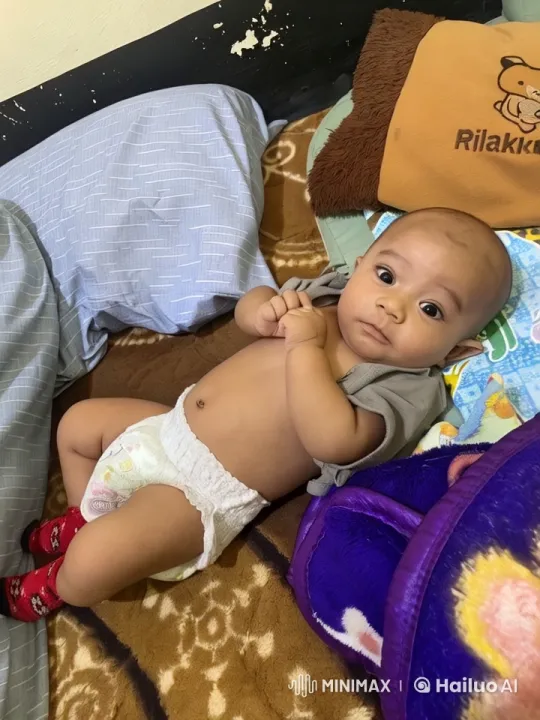 Baby Dancing Joyfully on Colorful Blanket – AI Generated Video | Hailuo AI