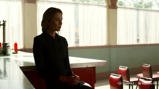 Lone Woman in Sunlit Diner Reflects Solitude – AI Generated Video | Hailuo AI