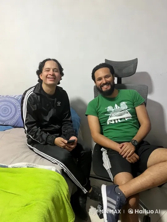Two Men Sharing an Intimate Kiss in a Cozy Setting – AI Generated Video | Hailuo AI