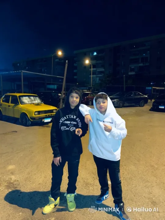 Urban Confrontation: Two Hooded Individuals in Night Parking Lot – AI Generated Video | Hailuo AI