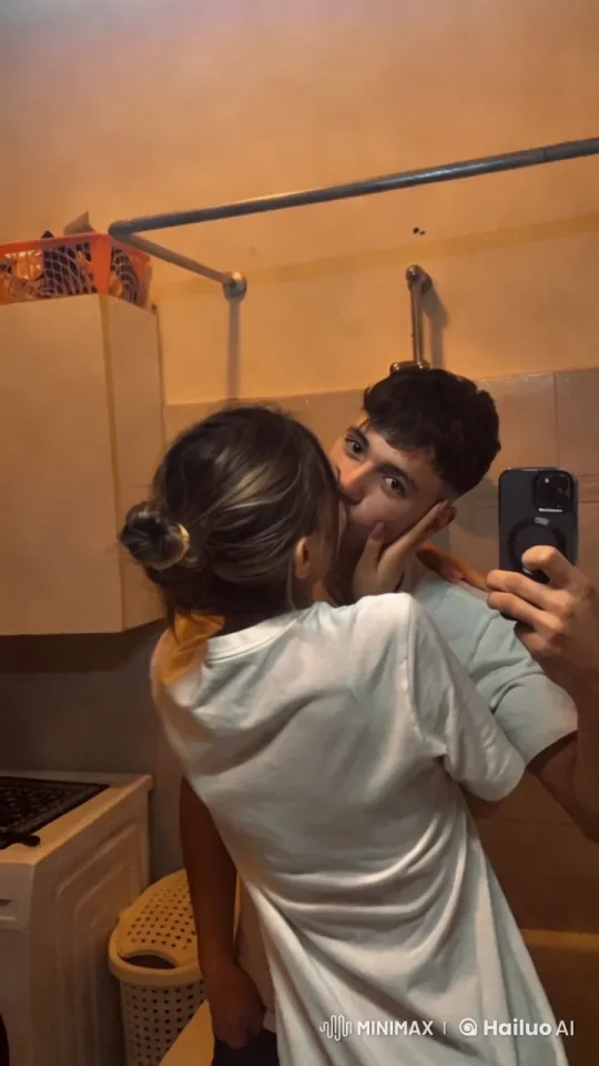 Couple's Intimate Kiss Captured in Cozy Bathroom Setting – AI Generated Video | Hailuo AI