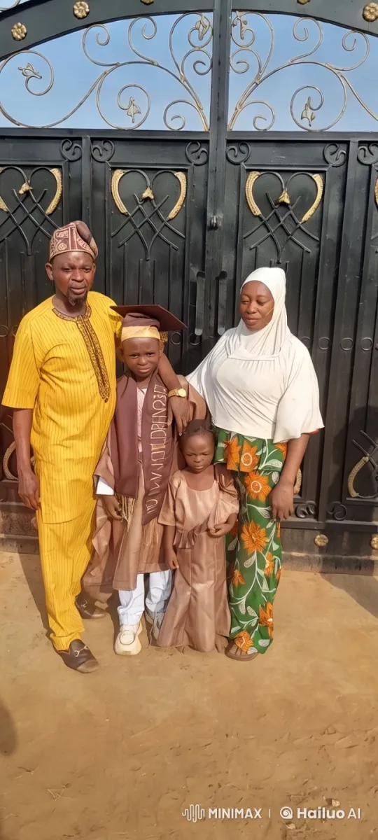 Family in Traditional Attire in Front of Decorative Gate – AI Generated Video | Hailuo AI