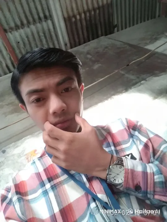 Rustic Aesthetic: Man in Plaid Shirt and Watch – AI Generated Video | Hailuo AI