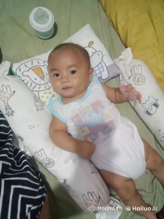 Baby's Playful Kungfu Dance on Cartoon-Themed Bed – AI Generated Video | Hailuo AI