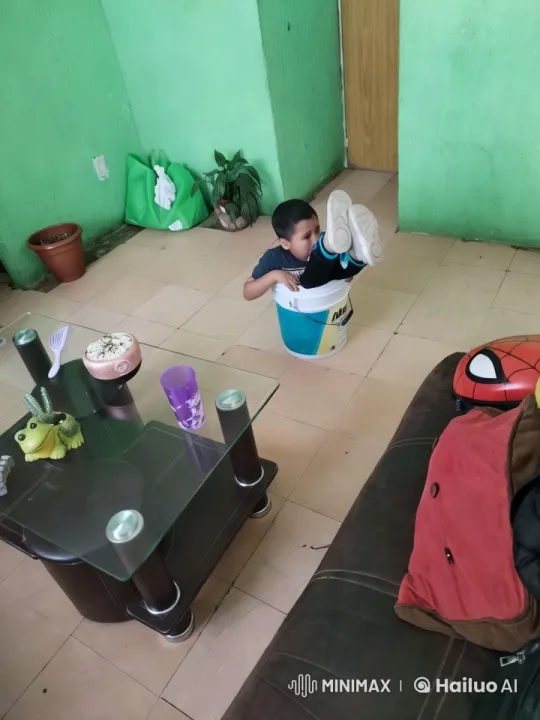 Child's Playful Struggle in a Colorful Living Room – AI Generated Video | Hailuo AI