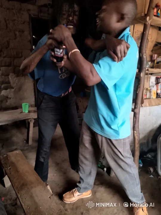 Rustic Room Struggle: Men's Physical Conflict Captured – AI Generated Video | Hailuo AI