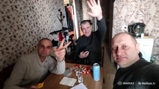 Men Chatting in Cozy Room with Floral Wallpaper – AI Generated Video | Hailuo AI